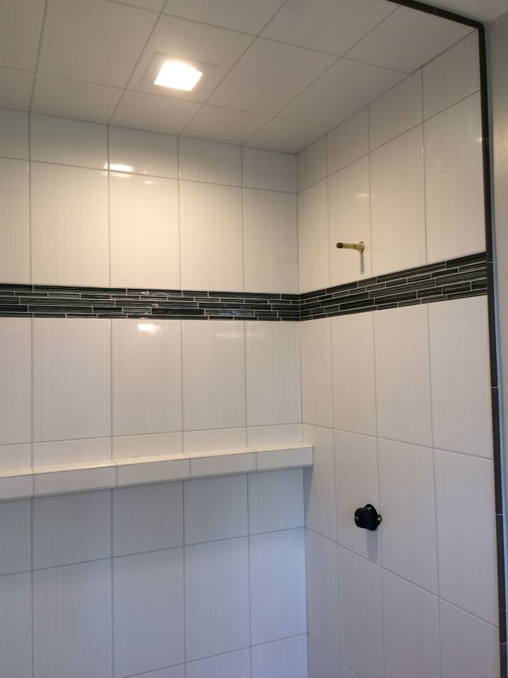 White Tile Shower with Dark Gray Glass Accent • N Koehn Tile • El Campo, TX